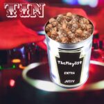 The artwork for this week's edition of #ThePlaylist. It features a can that looks like a Heinz bean can being played on a turntable like a record. The label of the can reads "ThePlaylist - Extra Juicy". The can is full of my baldy head, looking like a loads of beans.